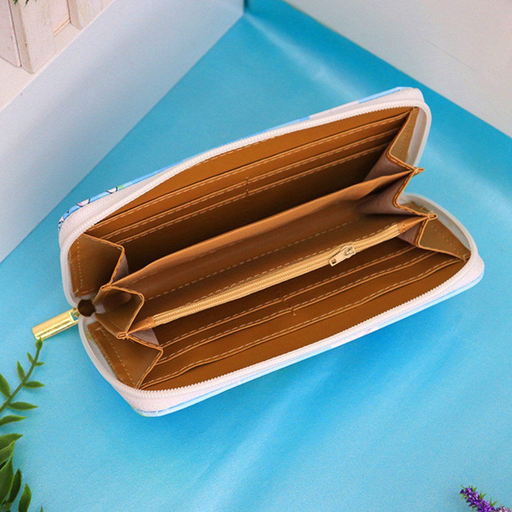 Ví da PU cầm tay in hình Doraemon cho nữ