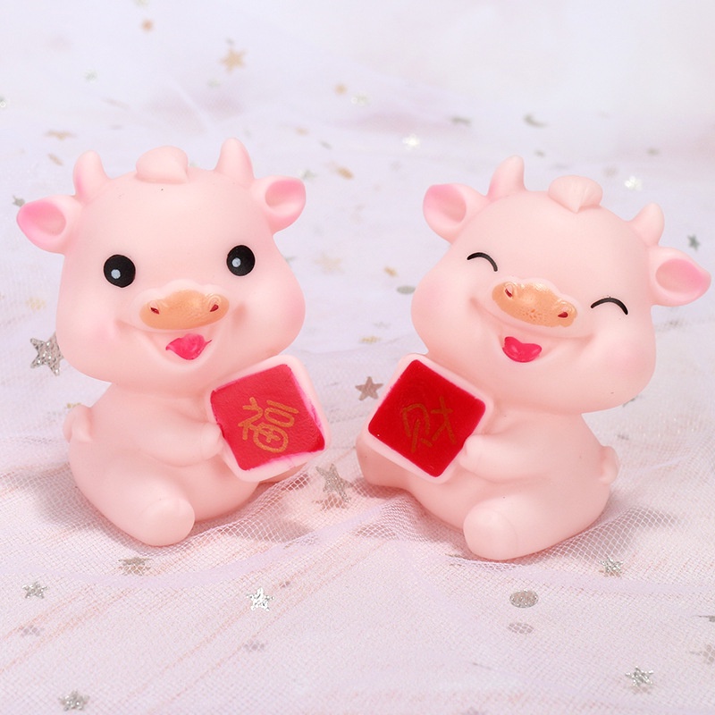 Trâu nhựa trang trí bánh kem