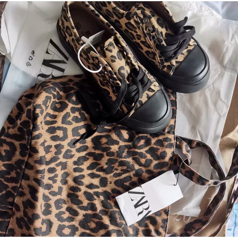 Giày thể thao độn đế da báo đế đen