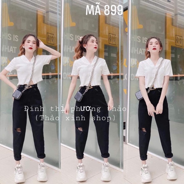 Quần bò boy đen rách gối được kiểm tra hàng