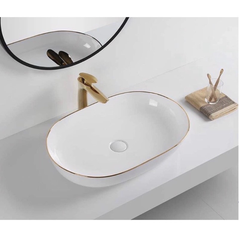 Chậu lavabo trắng viền vàng