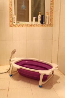 Chậu tắm trẻ sơ sinh gấp gọn