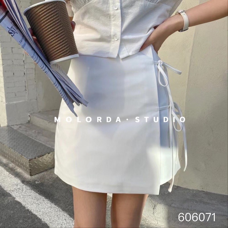 Chân váy ngắn thắt nơ điệu đà 606071