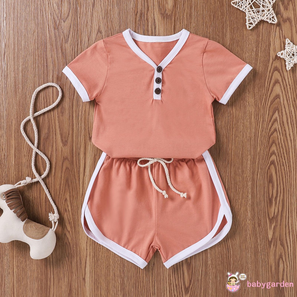 Set Áo Thun Ngắn Tay + Quần Short Buộc Dây Màu Trơn Hợp Thời Trang Cho Bé