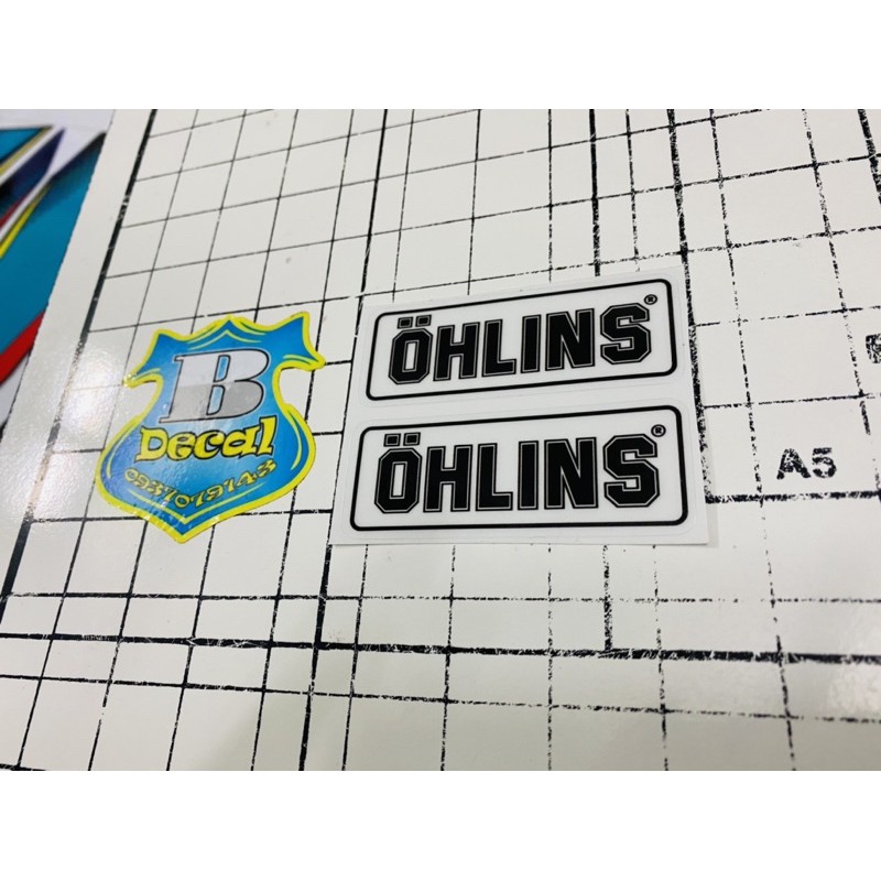 Căp Tem logo Ohlins in decal trong 3x7.5cm