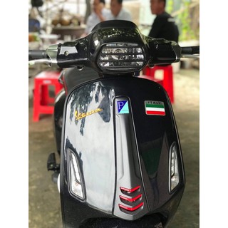 Ốp bảo vệ đèn pha Vespa Sprint