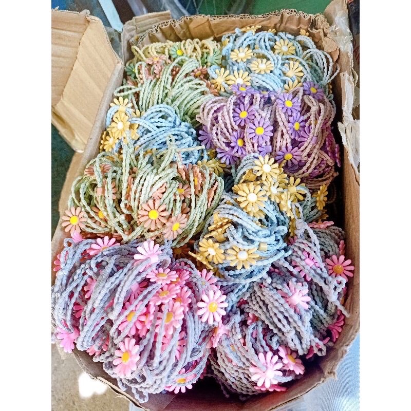 Thun cột tóc hoa cúc dễ thương