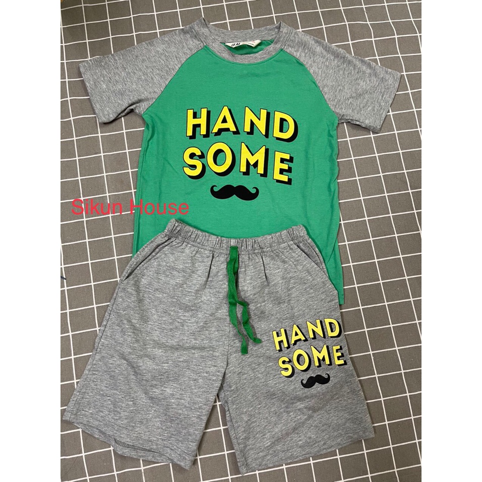 Bộ quần áo H&M ngắn tay cho bé trai màu xanh lá