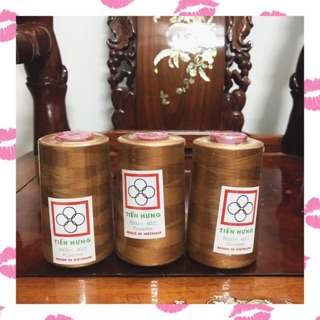 Chỉ may ống nhỏ màu nâu ngả vàng