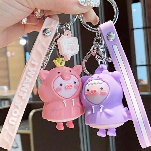 Móc khóa hình heo mặc áo mưa đáng yêu