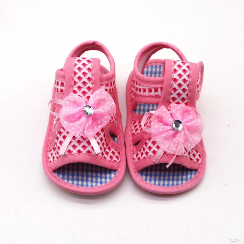 Giày sandals đế bằng thiết kế hoa xinh xắn chống trượt cho bé tập đi