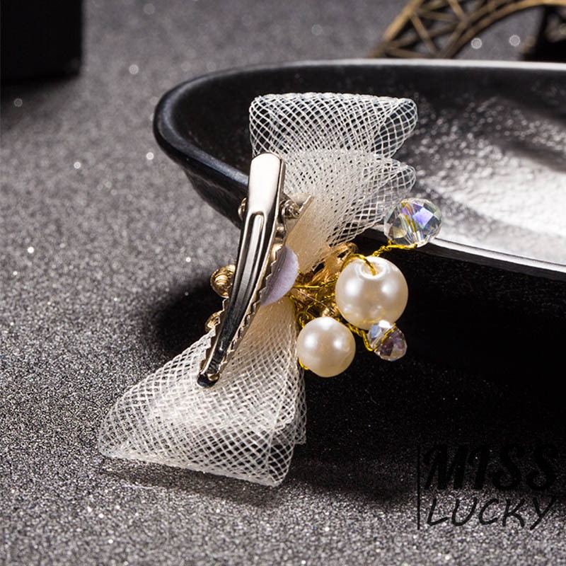 Set 4 kẹp tóc đính đá và ngọc trai giả thanh lịch cho cô dâu