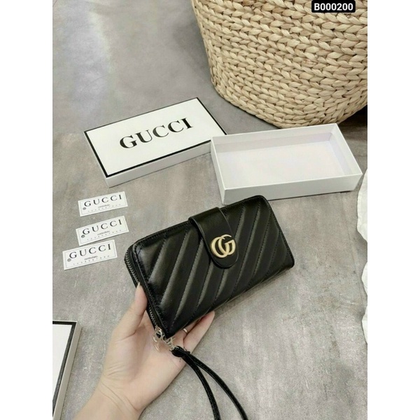 Ví cầm tay trần sọc chéo phối tag GC fullbox
