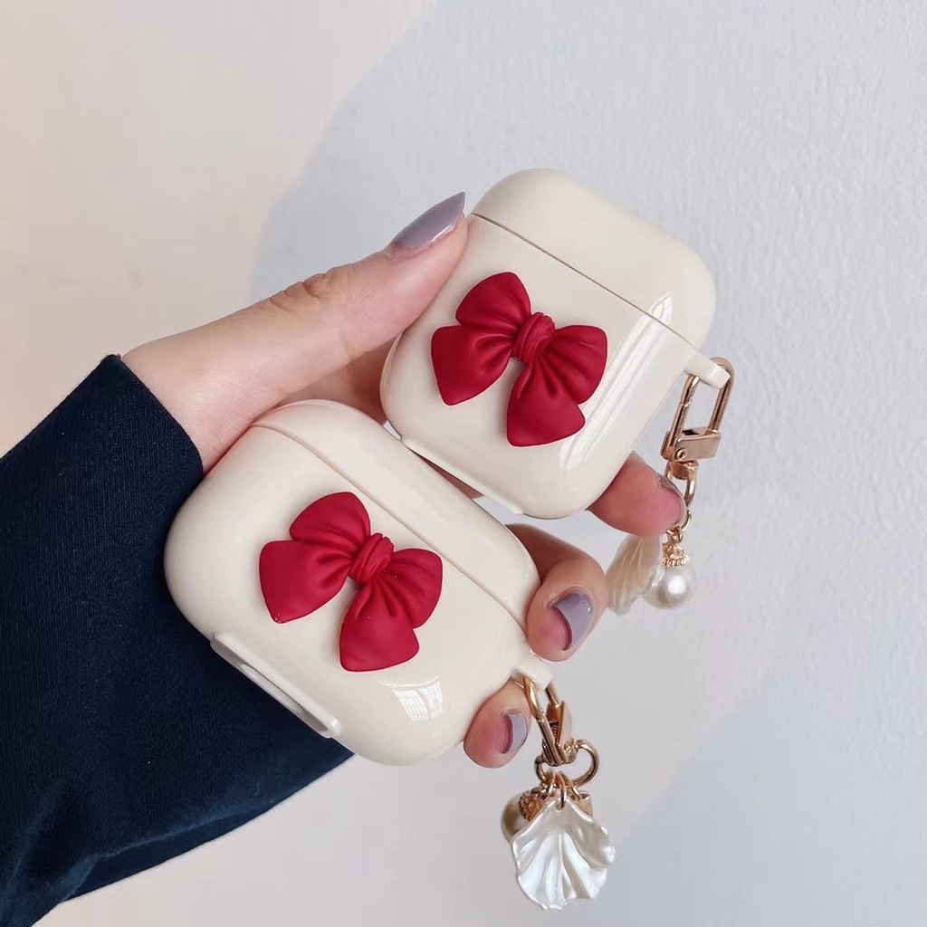 Vỏ Bảo Vệ Hộp Sạc Tai Nghe Bluetooth Apple Airpods 1 / 2 Pro Bằng Tpu Chống Thất Lạc Hình Nơ Màu Trắng