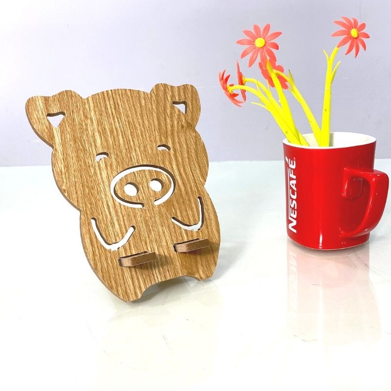 Kệ điện thoại giá đỡ máy tính bảng thông minh hình con heo dễ thương bằng gỗ kích thước 16.5cm x 14.2cm