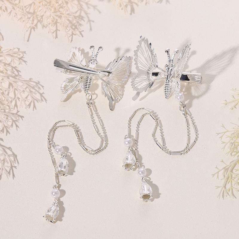 Set 2 kẹp tóc HAIMEIKANG kim loại hình bướm phối tua rua thời trang Hàn Quốc cho nữ