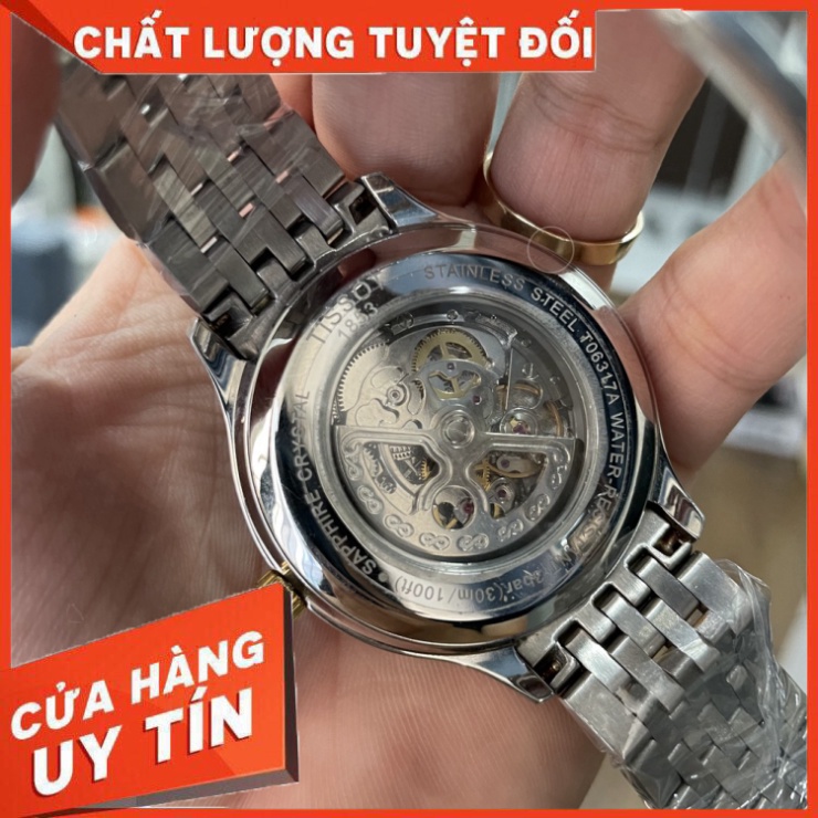 Đồng Hồ Nam Tiss0t Sapphire TA125 Case 42mm Mặt trơn lộ cơ 12h Máy cơ Automatic Nhật