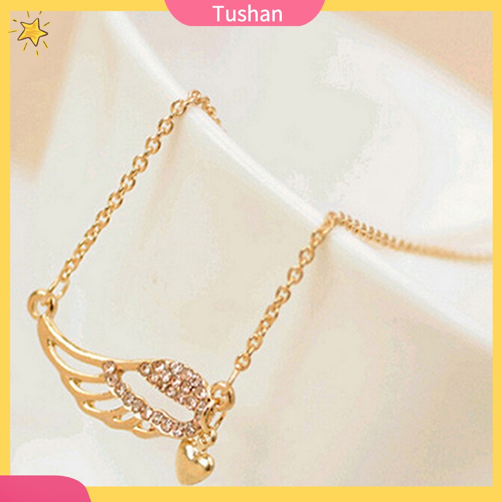 Dây chuyền mặt trái tim và đôi cánh thiên thần tush _