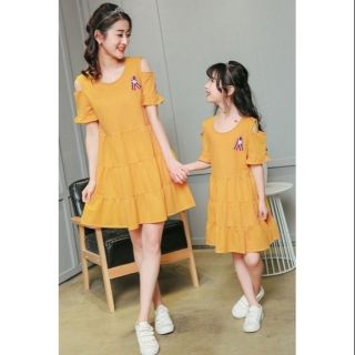 Đầm mẹ bé vàng Baby doll