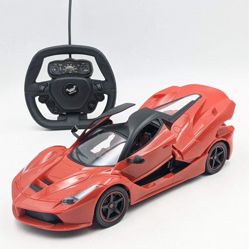 Siêu xe Ferari điều khiển đóng mở cửa - Điều khiển bằng vô lăng - Có đèn - Tỉ lệ 1:16