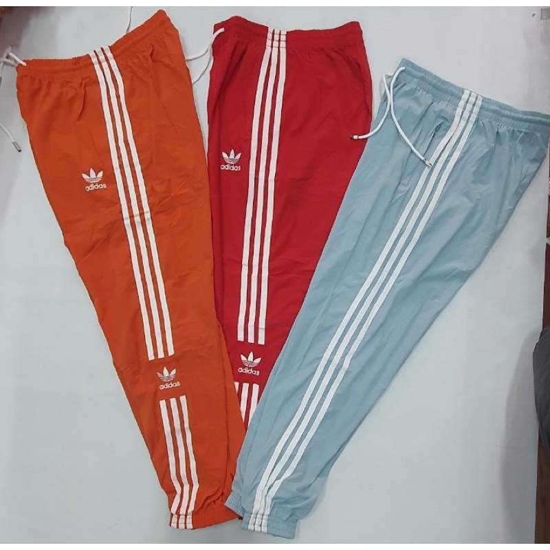 Quần gió nữ adidas vải dư sịn