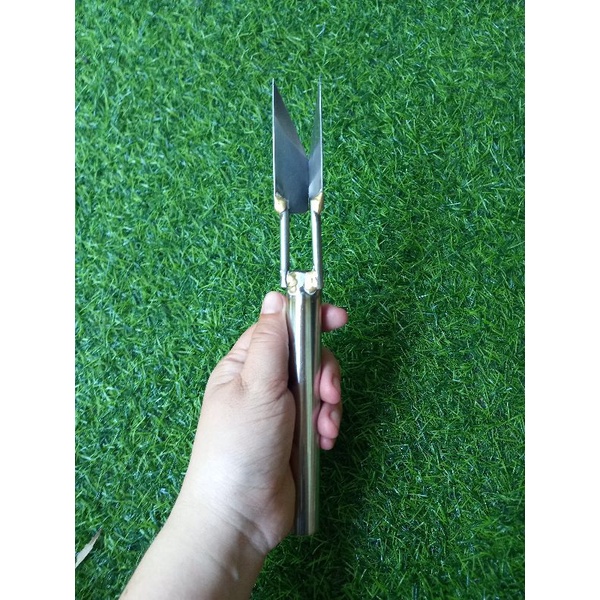 Dao  gọt  mắt  dứa