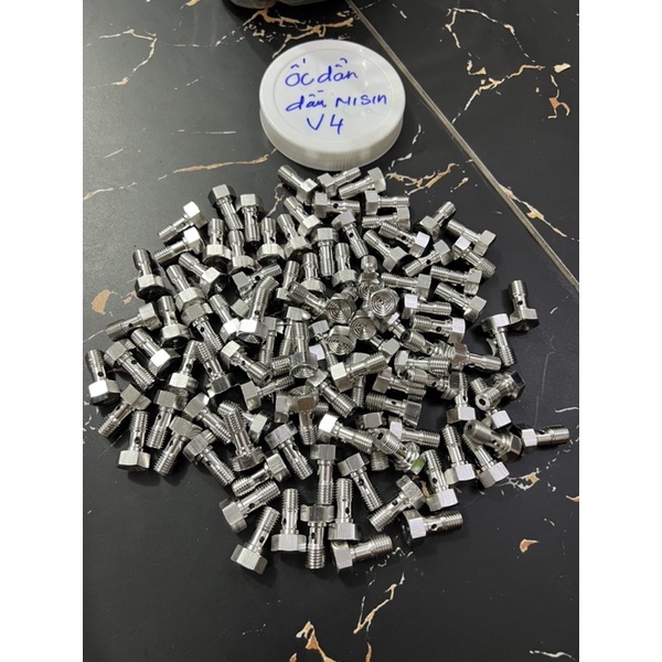 Ốc dầu Nissin / Brembo mẫu V4 salaya