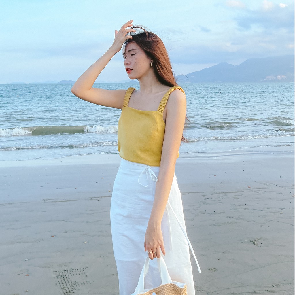 Set Fabric Holic - Áo 2 dây vàng mustard và Chân váy midi trắng | BigBuy360 - bigbuy360.vn