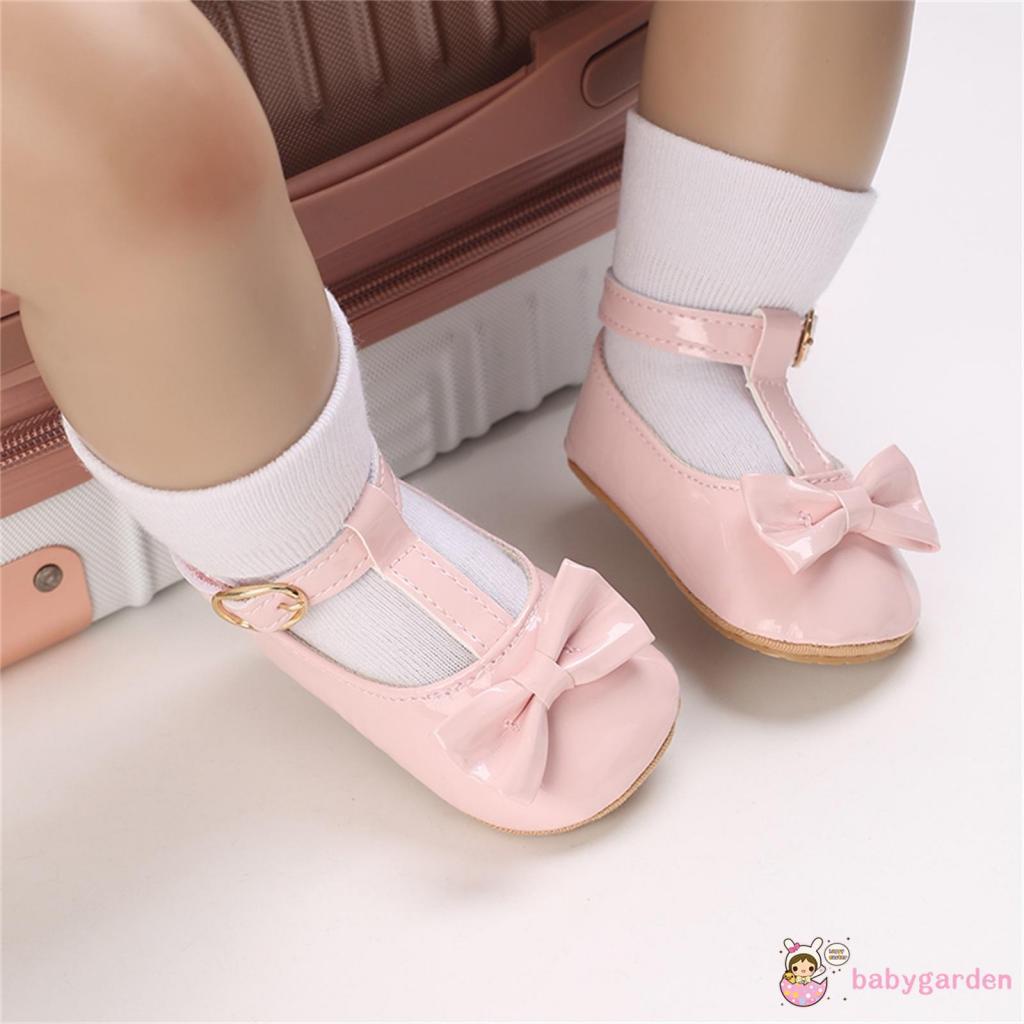 Giày Tập Đi Đế Bằng Chống Trượt Hở Lỗ Màu Trơn Có Nơ Cho Bé Gái