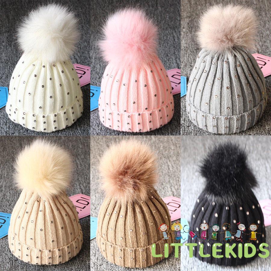 Mũ len giữ ấm đính quả bông cho bé