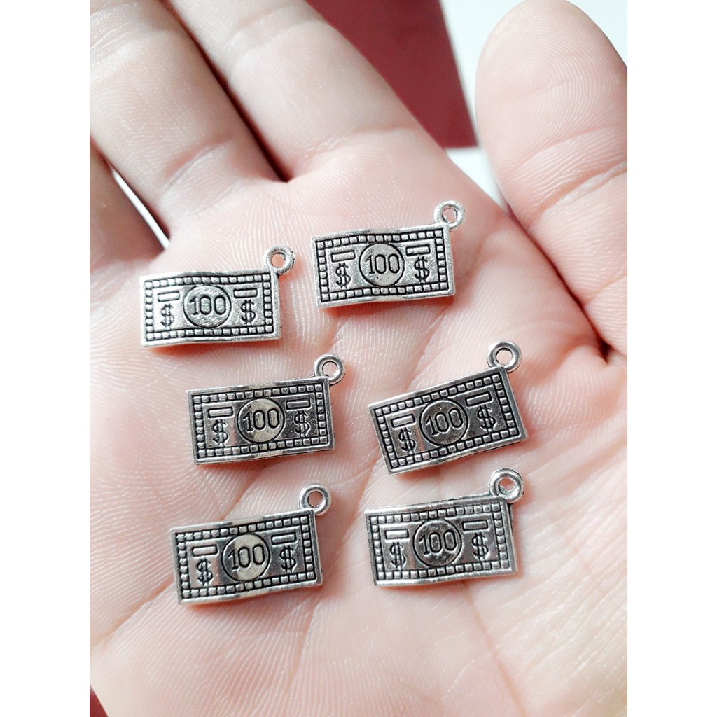 Charm sỉ giá rẻ : 50 gram = 23k / 1 gói [ Charm bạc cổ giá sỉ TPHCM ]