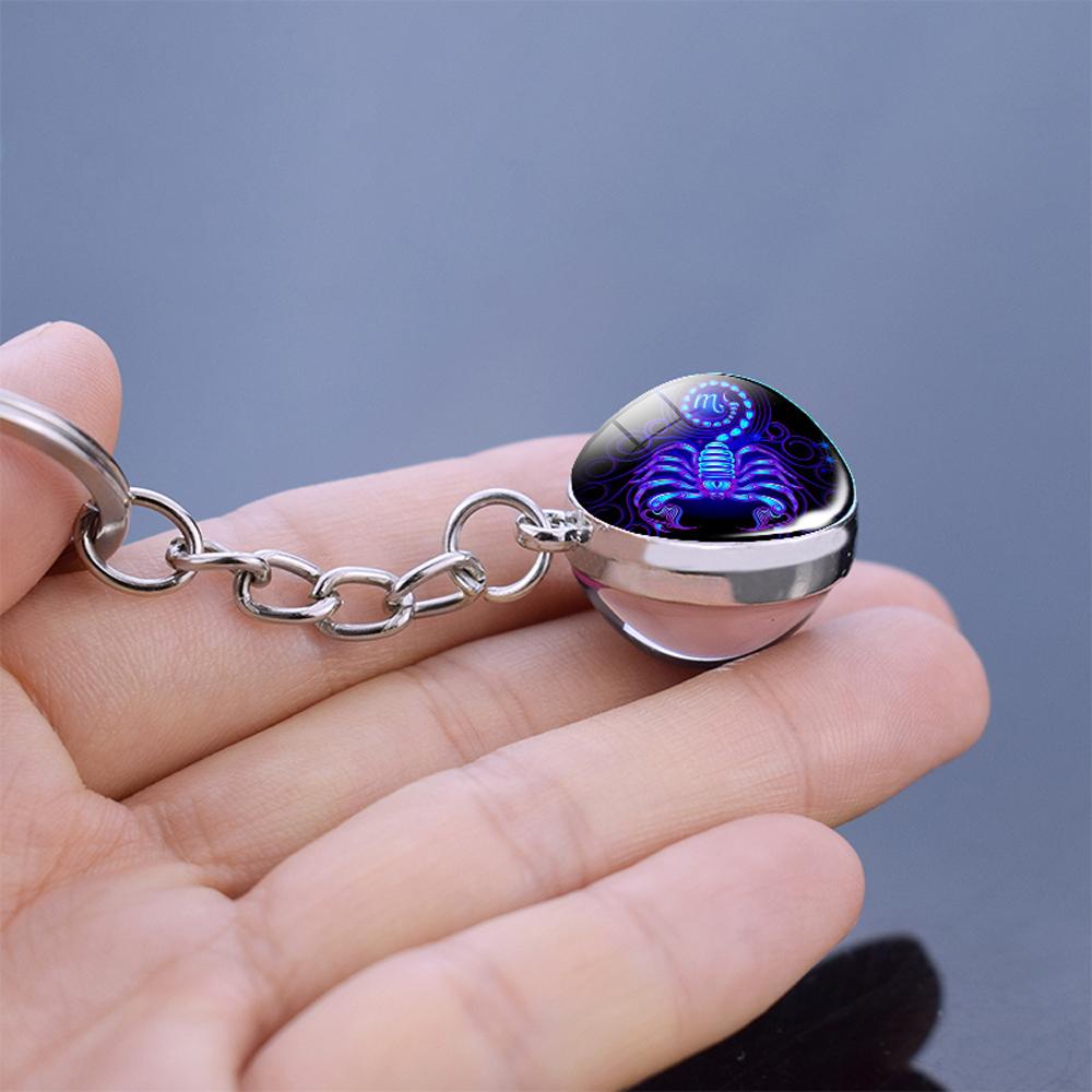 Móc Khóa Quả Cầu Thủy Tinh 12 Cung Hoàng Đạo Dạ Quang Hai Mặt Thời Trang Unisex