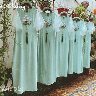 Áo dài màu xanh Emerald là một màu sắc truyền đạt sự hài hoà của thiên nhiên