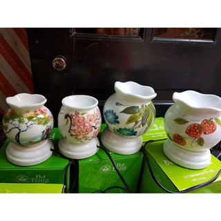 Combo mua 1 đèn xông tinh dầu loại nhỡ tặng 1 lọ tinh dầu và 1 bóng đèn thay thế