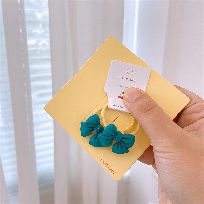 Dây Cột Tóc Co Giãn Đính Nơ Màu Kẹo Dễ Thương Cho Bé Gái