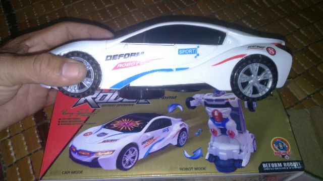 Xe chạy PIN biến thành Robot có nhạc và đèn Led rất đẹp (tặng kèm PIN)