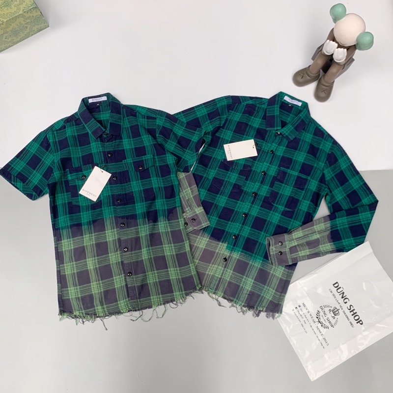 Sơ mi kẻ loang hoạ tiết rách tat tơi ở đuôi áo