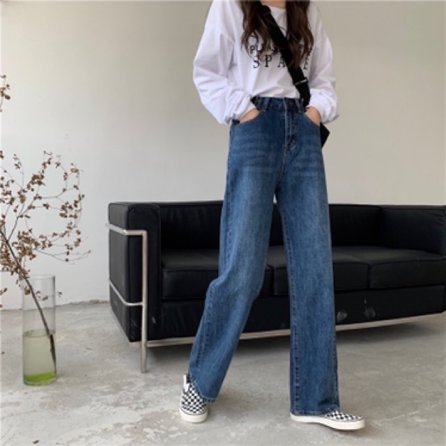 Quần jeans cài nút eo phủ gót