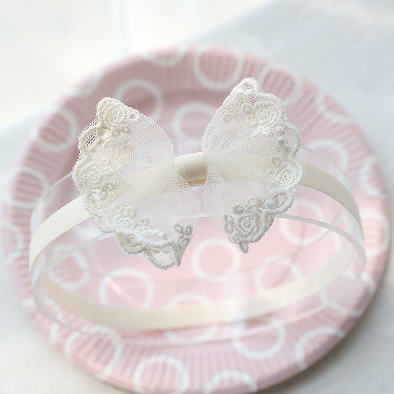 Băng đô hoa, nơ màu kem cho bé gái đáng yêu