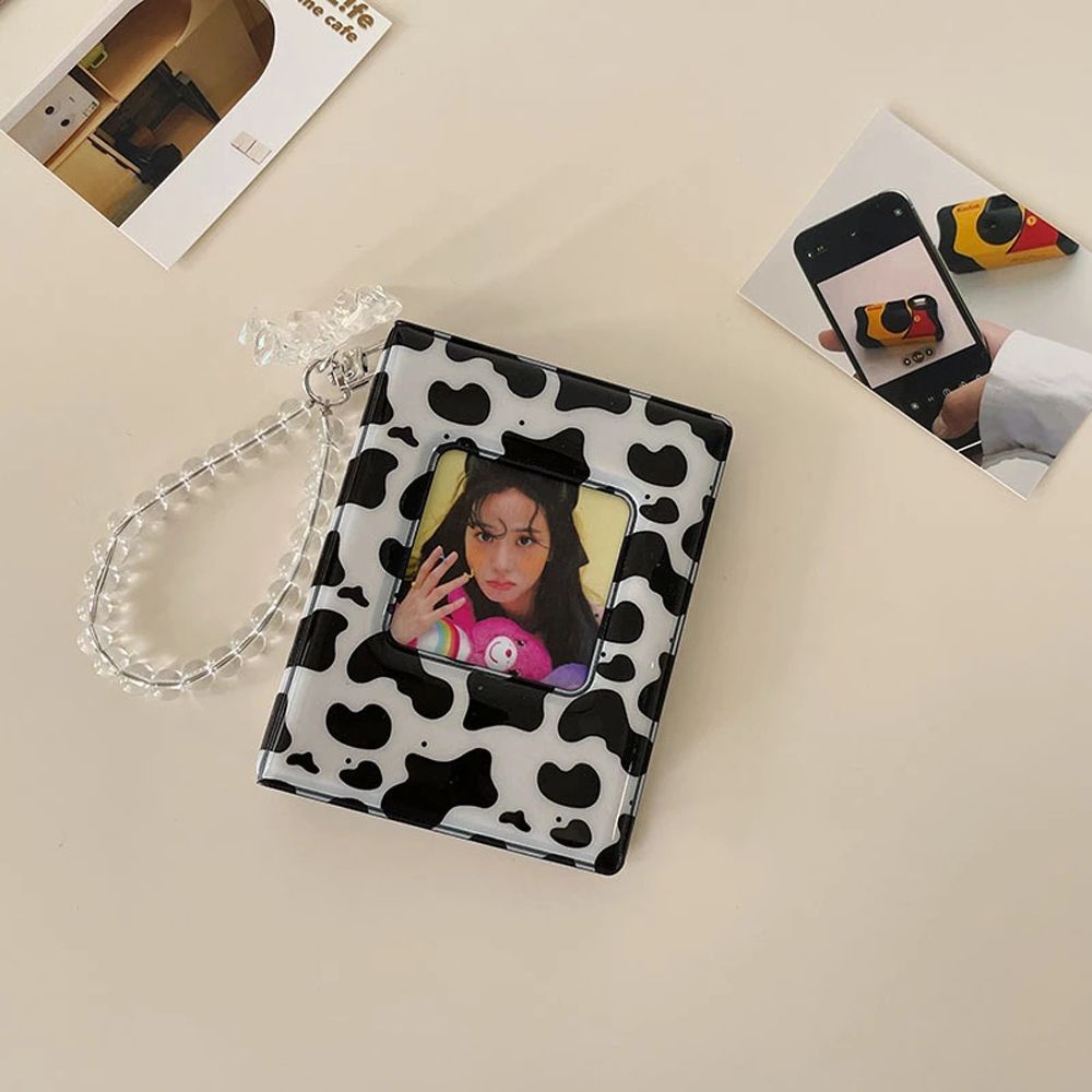Album đựng ảnh mini gồm 16 trang thiết kế bìa họa tiết bò sữa kích cỡ 8.5×11×2.6cm