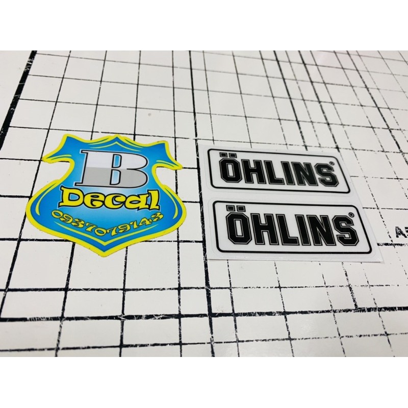 Căp Tem logo Ohlins in decal trong 3x7.5cm