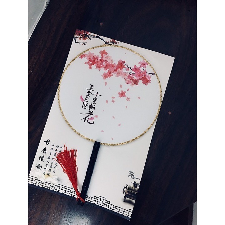 Đào nhi Quạt tròn cổ trang Hoa đào tam sinh tam thế thập lý đào hoa tua rua cầm tay nan trúc cán đen