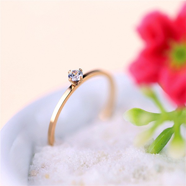 Nhẫn titan 1 hột xoàn nổi mạ vàng 14k