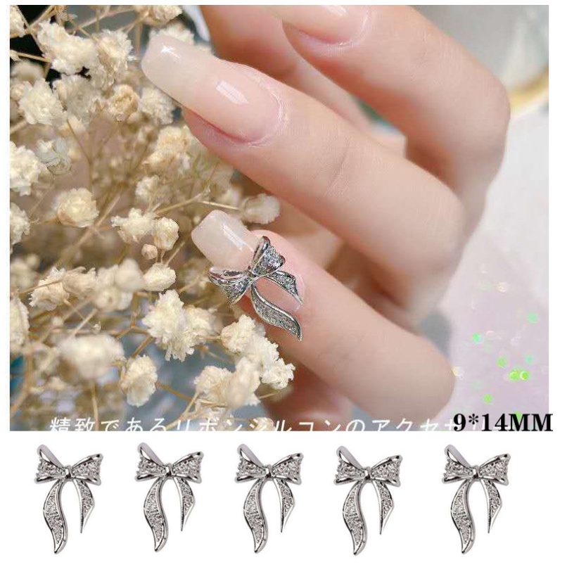 charm trang trí nail nơ nhé a