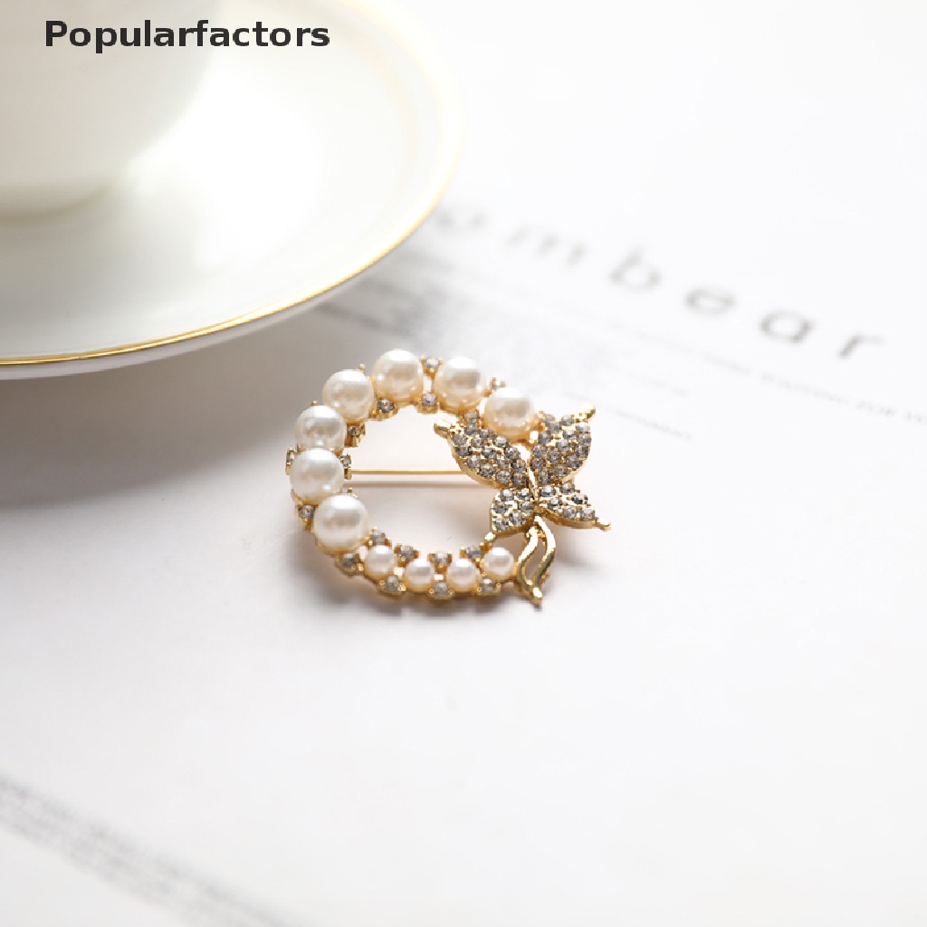 Ghim cài áo hình bướm và ngọc trai thanh lịch