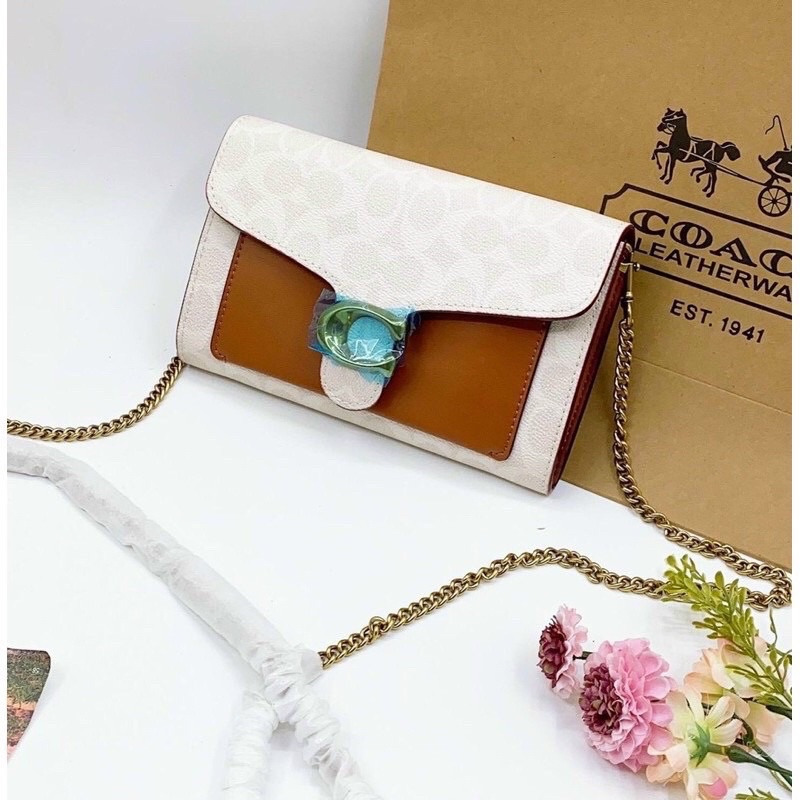 Túi đeo chéo kiêm clutch tabby