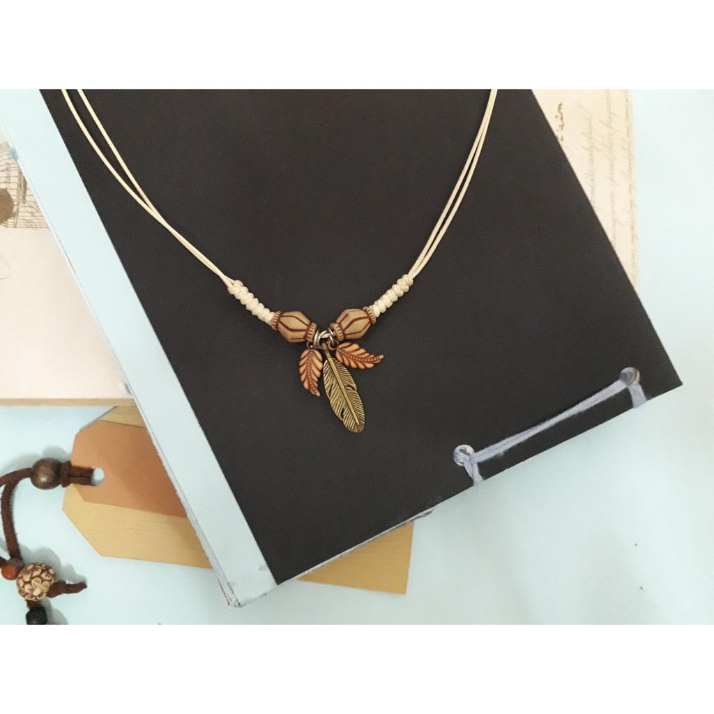 vòng cổ lông vũ dây đan handmade