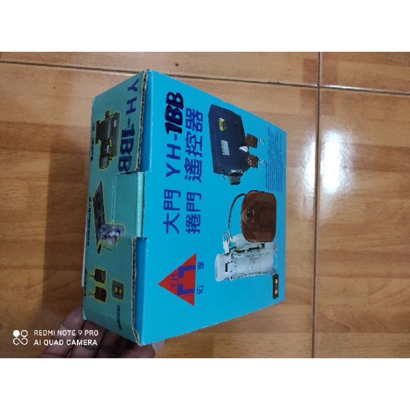 Tay điều khiển cửa cuốn YH 1B2-1BB mã nhảy 315 mhz Đài loan Xịn và Copy