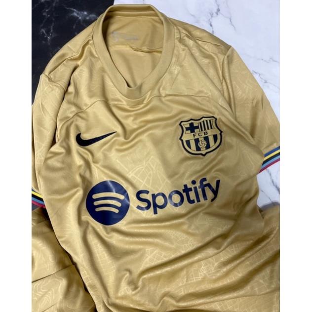 Set bộ quần áo thể thao bóng đá nam nữ clb barca vải gai mịn màu vàng đồng logo thêu đầy đủ 2022 2023
