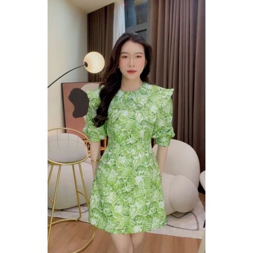Đầm xanh họa tiết hoa hồng